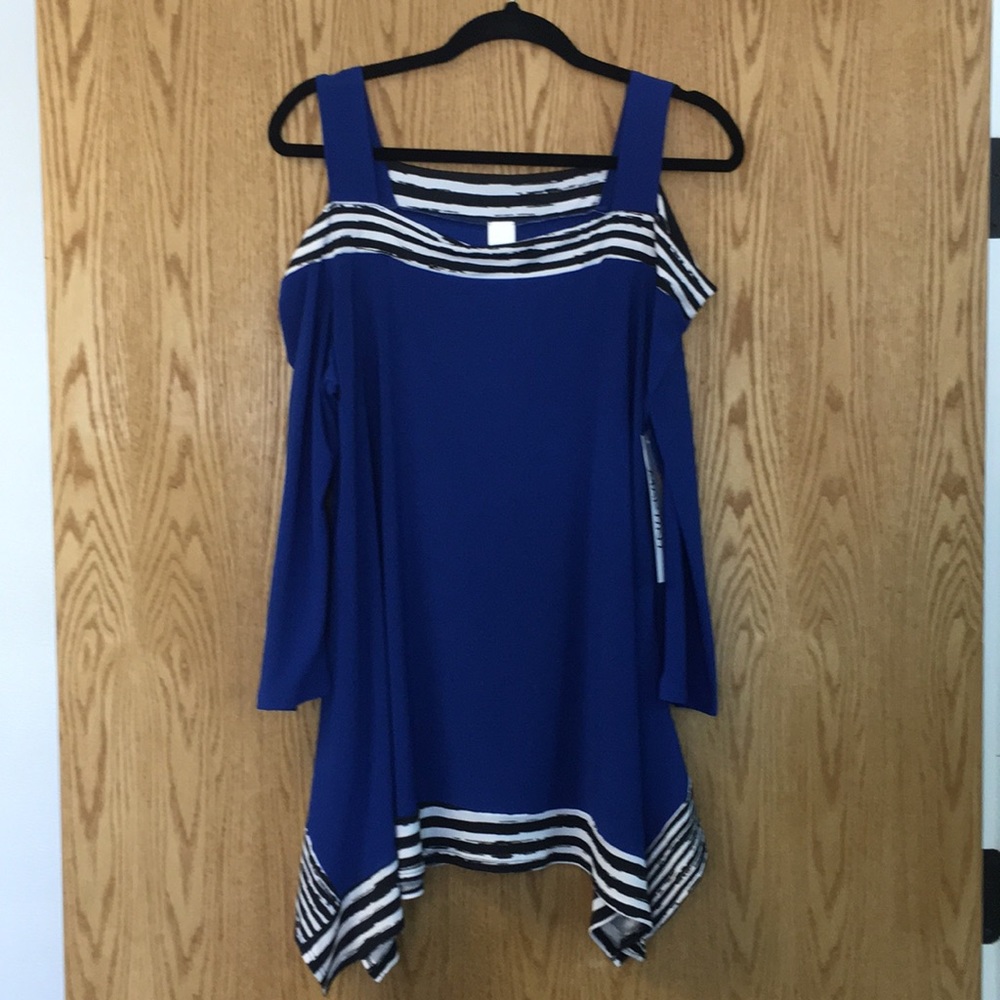 Cold shoulder shark bite tunic.